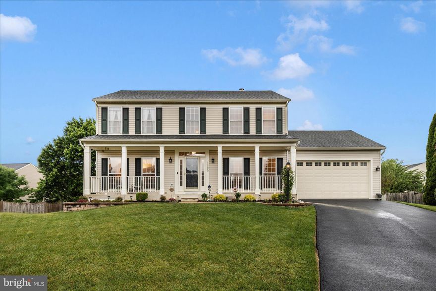 Welcome home to this stunning move-in ready colonial packed with the WOW factor today’s buyers are searching for in the sought-after Walnut Ridge subdivision!  From the moment you arrive, the charming full front porch invites you to relax with your morning coffee or unwind in the evening. Step into the backyard oasis featuring a spacious multi-level deck, covered concrete patio, beautiful brick paver extension, storage shed, partially fenced yard, and an incredible large, flat lot perfect for entertaining, play, or simply enjoying the outdoors.  Inside, you’re greeted by a bright foyer with refinished hardwood floors and elegant finishes throughout. The main level offers a private office, formal living and dining rooms, plus a warm and inviting family room and breakfast area — all enhanced with crown molding and chair rail detailing.  The beautifully appointed kitchen is designed for both everyday living and entertaining, featuring abundant 42” cabinetry, stylish backsplash, oversized island, and double sink.
Upstairs, hardwood stairs lead to the impressive owner’s suite complete with two closets, including a walk-in, ceiling fan, and a spa-inspired luxury bath with ceramic tile floors, tiled shower, dual vanities, wainscoting, and crown molding. Three generously sized secondary bedrooms provide plenty of space, including one with its own sitting area. A spacious hall bath with double vanity and tub/shower combination completes the upper level.   The finished lower level adds even more flexible living space with a full bath, large recreation/family room with walkout access to the backyard, utility room, and laundry area with utility sink.  This meticulously maintained home offers true peace of mind with HVAC servicing twice yearly, the 50-year roof is only 12 years old, water heater is new, updated toilets and faucets throughout, fresh paint in many rooms, and brand-new carpet in two bedrooms.  Conveniently located near shopping, dining, gas stations, Ft. Detrick, and major commuter routes, this exceptional home truly has it all.    Don’t miss your opportunity — homes like this don’t stay available for long!