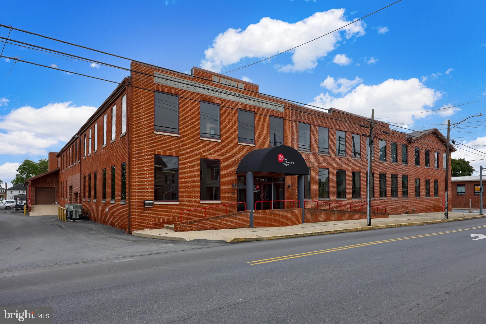 1920's former Miller & Hess Shoe Company in Akron, Pa. Zoned Mixed Use which can provide for numerous by right uses. This could be a tremendous redevelopment opportunity for multi family or Senior Living. Terrific brick facade with hardy interior "bones" to provide for a good quality base for interior improvements. 64,981 SF on three floors sititng on about 2.5 acres. The building is sprinklered. and ceiling heights range from 9'-12'. There is exisitng parking for over 100 vehicles. Use it as is for office, warehouse, distribution, and processing procedures. All three floors are served by a freight elevator. Use your imagination and be part of this wonderful community at the corner of "Main & Main" at the traffic light. The neighboring property at 718 Main St. is included in this purchase and listed price. The home is a 1,941 SF cape cod style single family home that is currently rented month to month.