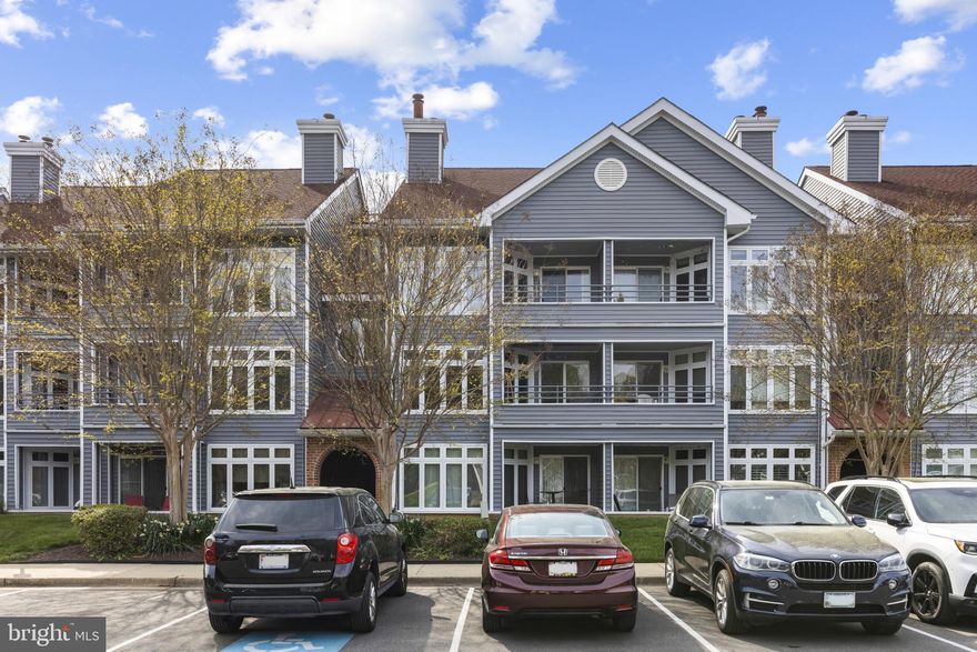 Experience elevated condo living in this beautifully updated top-floor penthouse, nestled in the coveted Lake Heron community of Annapolis. The spacious open-concept layout features gleaming hardwood floors, soaring cathedral ceilings, and a dramatic floor-to-ceiling stone fireplace, creating an inviting focal point in the main living area. Step out onto the private balcony to enjoy your morning coffee or unwind as the sun sets, with serene views of the surrounding trees offering a peaceful escape.The beautifully updated gourmet kitchen boasts newer stainless steel appliances, custom tile backsplash, sleek quartz countertops, and ample cabinet space, making it both stylish and functional. A charming spiral staircase leads to a spacious loft, enhanced by skylights that flood the space with natural light—ideal for a home office, reading nook, or play area. The generous primary suite is a true retreat, featuring a custom walk-in closets, beautifully renovated en-suite bath, and its own private balcony. A second bedroom and full bath on the main level offer flexibility for guests or additional living space. Additional highlights include a farmhouse-style sliding barn door concealing the in-unit washer and dryer, and tranquil wooded views just steps from Chase Pond. Enjoy resort-style living with access to the community’s outdoor pool, updated fitness center, and waterfront area with a pier—perfect for kayaking or enjoying summer days on the water. Just minutes to Historic Annapolis, shopping, dining, the Naval Academy, and all major commuter routes to Baltimore, Washington D.C., and the Eastern Shore, this is a rare opportunity to own a beautifully updated penthouse in one of Annapolis’ most desirable communities.