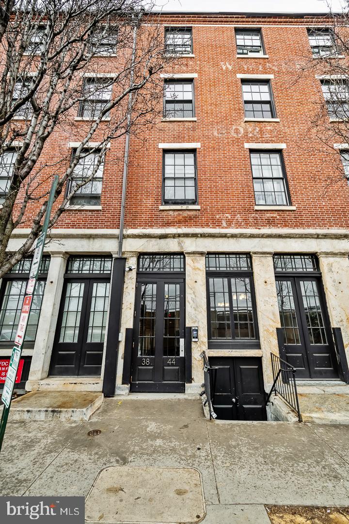 Make this 2 bedroom/2 full bath LOFT your next residence and you will never want to move again! There is no reason to. This home
has the charm and location that every discriminating buyer is looking for. Situated in the THRIVING heart of OLD CITY in the Historic Winnie Building, built in the 1880s along Warehouse Row in Old City, nothing compares to this setting with its proximity to the river, the excitement of Front and Market Streets, and the quaint cobblestone streets near the chic and trendy shops and restaurants in Center City's cultural hub. This home features a spacious floor plan and stunning finishes that include original exposed brick, original hardwood floors with six-inch baseboards, solid wood doors, insulated wood windows, and soaring high ceilings. Walk into your new apartment and down a gallery hallway perfect for showcasing art with a huge coat closet and the stackable washer/dryer discreetly
tucked away from sight. Once inside the space opens nicely. Unfolding the open concept kitchen/living/dining room. The thoughtful kitchen maximizes space and boasts stainless steel cabinetry, glass door upper cabinets, granite countertops, a breakfast bar and a GAS range. The dining area is spacious and the living room has fantastic views of the Delaware river and the Ben Franklin bridge.
The generous primary bedroom has a walk-in closet and a tastefully ensuite bath with a double vanity. The 2nd bedroom shares the
hallway bath that doubles as a powder room for guests. Other qualities unique to the Winnie Building are Verizon Fiber-Optic access in each unit and a landscaped community courtyard. The well-lit basement has a designated space for extra storage. The elegant lobby is protected with security cameras for extra safety, and the building is professionally managed. Beyond the beautiful condo itself, you will love being within walking distance to the many great shops, restaurants and attractions that Old City has to offer. You are just steps away from Race & Cherry Street Piers, La Peg Brasserie, Independence Hall and more! Grab a cheesesteak at Sonny’s, delicious ice cream cone at Franklin Fountain or inhale the sensational aroma of caffeine from Cafe Ole. Close to public transit, as well as all the galleries, shops, and bars that this sought-after area has to offer. Enjoy First Fridays in Old City every month and the Farmers Market a block away on Wednesdays. With a Walk Score of 99 and a Transit Score of 96, this location is a commuter’s paradise, offering easy access to public transportation and major highways. Live steps away from iconic landmarks like Independence Hall and the Liberty Bell. Explore an array of restaurants, cafes, and galleries right outside your door. Enjoy nearby parks and green spaces, perfect for outdoor activities. The Park at Penn’s Landing (an 11.5-acre civic space) is currently under construction. This exceptional condo offers a unique opportunity to own a piece of Philadelphia’s rich history while enjoying the comforts of modern living. Don’t miss your chance to make this stunning property your new home!