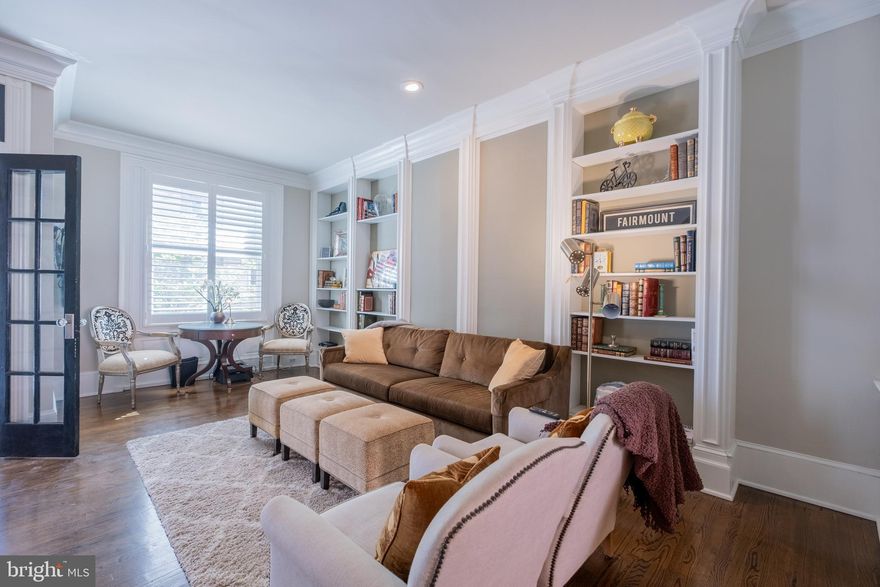 This stunning and meticulously maintained BROWNSTONE, nestled on one of FAIRMOUNT’s most coveted blocks, radiates timeless charm and refined elegance across all levels.
Step through to an all-open living and dining area with magnificent hardwood floors and chef’s kitchen. Your eye will instantly be drawn to your PRIVATE OUTDOOR OASIS which extends your living space 6 months of the year.
Upstairs, the wood staircase leads to a skylit hallway and two spacious bedrooms and two magnificent bathrooms. 
The lower level offers incredible versatility with a bright and welcoming family room, office area, and powder room. A large front window fills the space with natural light.
Throughout the home, you’ll find soaring 10-FOOT CEILINGS, intricate CROWN MOLDING, tall baseboards, and gleaming OAK HARDWOOD FLOORS.
This ART MUSEUM AREA LOCATION IS UNBEATABLE—peacefully situated across from Fairmount Park, the Art Museum, and Kelly Drive, and yet just five minutes to the University of Pennsylvania, CHOP, Comcast, Fairmount Avenue, the Parkway, Schuylkill River Trail, Boathouse Row, and Whole Foods. 
Every inch of this residence has been thoughtfully designed with TOP-OF-THE-LINE FINISHES and Architectural Digest-worthy style. A true gem in the heart of Fairmount, perfect for living and entertaining.