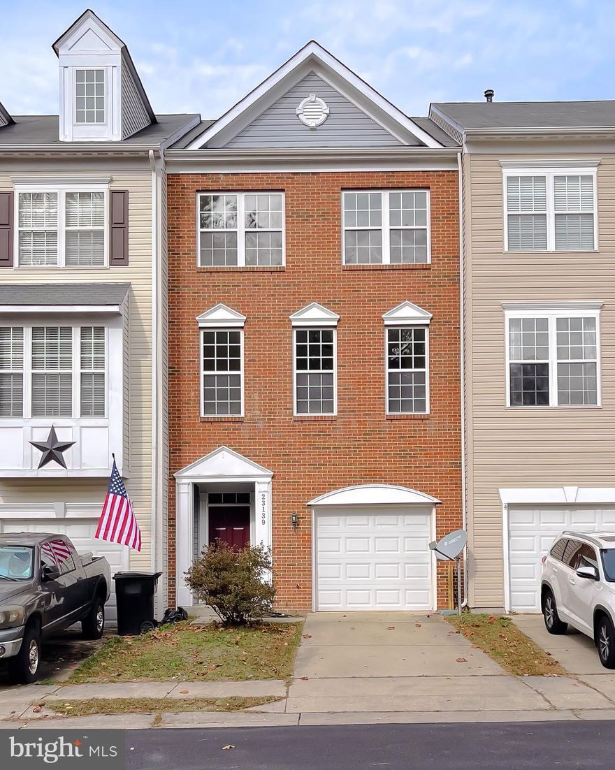Welcome to 23139 Primrose Way, a freshly updated three-story brick-front townhouse in the sought-after Primrose Park of Wildwood Community in California, MD. This move-in-ready home combines comfort, convenience, and style. Featuring new ss appliances, new carpet, fresh paint throughout, and modern upgrades inside and out.

✨ Main Level
    •    Entry through a wood-floored foyer with fresh paint and brand-new carpet throughout
    •    One-car garage to the right and a closet to the left for storage
    •    Half bath with new flooring
    •    Bonus room / potential 4th bedroom with sliding glass doors that walk out to the backyard
    •    Closet for additional storage space
    •    Fairly new roof and HVAC system only a few years old

🍽️ Second Level
    •    Open-concept layout featuring a family room / dining combo with ceiling fan and natural light
    •    Half bath conveniently located on this level
    •    Modern kitchen with:
    •    Stainless steel appliances – refrigerator, dishwasher, oven, and microwave
    •    Wood cabinetry and center island
    •    Pantry for extra storage
    •    Fresh paint and new carpet continue throughout

🛏️ Third Level
    •    Laundry area with washer and dryer conveniently located upstairs
    •    Primary suite includes:
    •    Walk-in closet plus additional closet
    •    Private ensuite bath with dual sinks and shower
    •    Bedroom 2: Ceiling fan and walk-in closet
    •    Bedroom 3: Ceiling fan and standard closet
    •    Full hallway bath serving bedrooms 2 and 3

🌳 Community Features

Located in the desirable Primrose Park of Wildwood Community, residents enjoy access to:
    •    Clubhouse & swimming pools
    •    Playgrounds & picnic areas
    •    Walking trails & open green spaces
    •    Convenient parking in front of the home