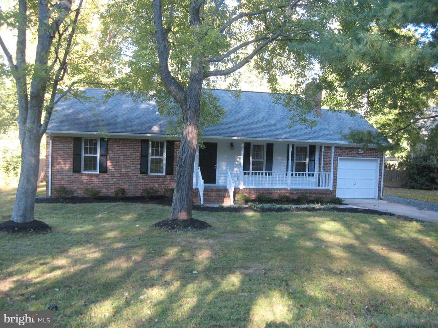 Adorable Waterfront Rambler in Gated Community! Neutral paint inside & out! Living Room w/vaulted ceiling/woodburning FP. Newer stainless appliances. Beautiful wood floors, ceramic tile/bathrooms. French doors open to stamped concrete patio. Flat backyard-partially fenced. Located on quiet part of Aquia Dr./close to front gate.  **INITIATION FEE WAIVED w/2+ yr. lease**  Pets Case-by-Case Basis.