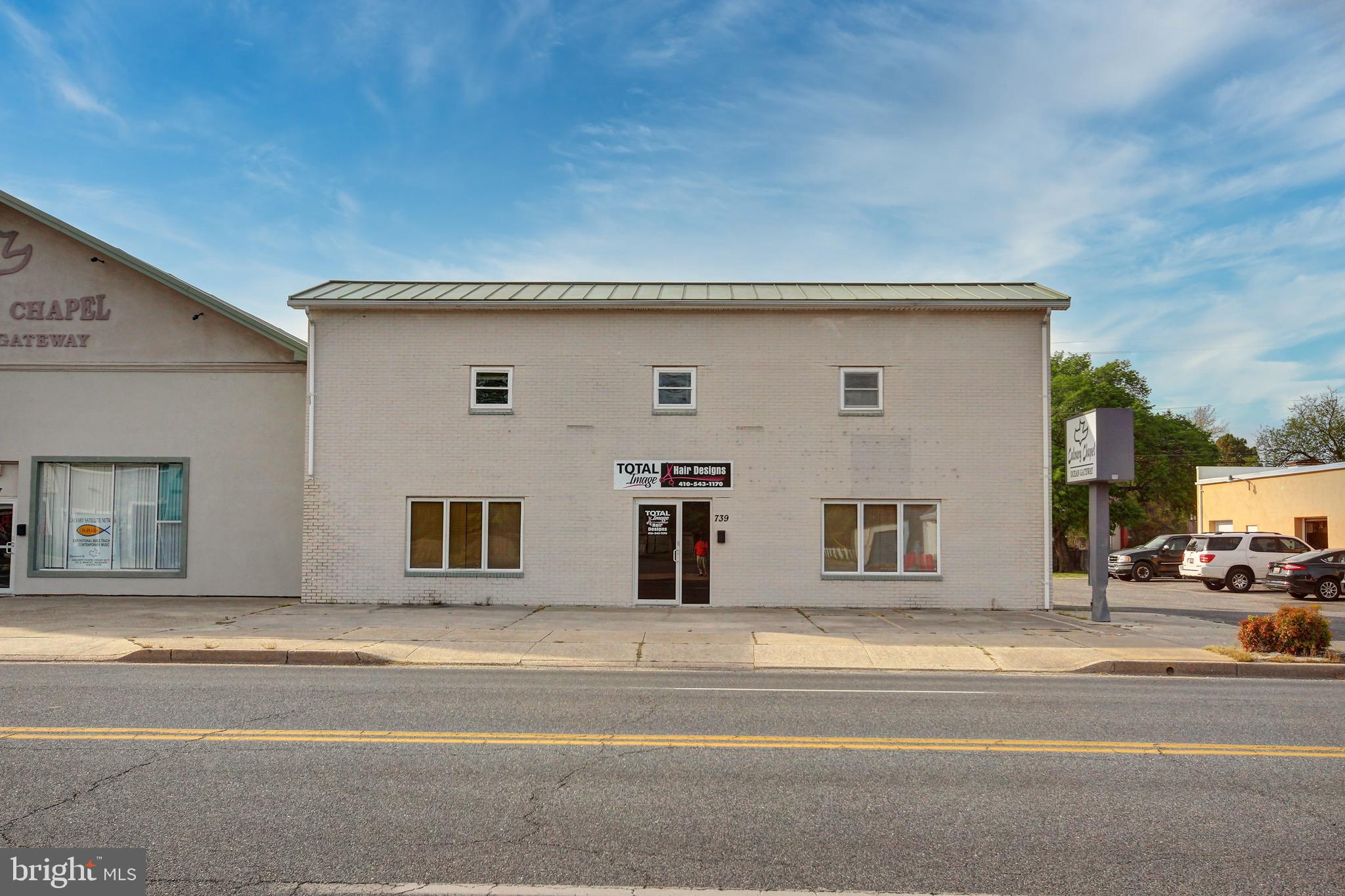 Great investment and an opportunity to own a building in a location close to downtown Salisbury. This is a two story building with separate entries. The lower level has a main entry, two separate rooms and a half bathroom. The second level has a stairway leading to one large room with a half bathroom. Additional adjacent building 737 E Main Street is for sale. Call to schedule a tour.