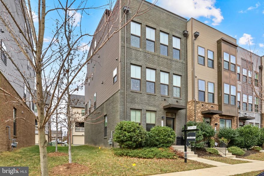 Welcome to this exquisitely maintained 5-bedroom, 4.5-bath luxury townhome, built in 2017 and bathed in natural light throughout. Thoughtfully upgraded and impeccably cared for, this spacious residence combines modern elegance with exceptional comfort in a highly desirable location. From the moment you enter, the home’s refined finishes, abundant windows, and seamless indoor/outdoor flow create an inviting atmosphere perfect for both everyday living and sophisticated entertaining.

The home features numerous high-end enhancements, beginning with the professionally installed showroom-quality epoxy flake flooring in the two-car garage. Inside, nearly every room is elevated by custom Hunter Douglas Duette UltraGlide energy-efficient shades, complemented by professionally installed custom curtain rods and drapery for a polished, designer look. One of the home’s most exceptional features is the upgraded second-floor covered porch—unique to this end-unit—where both the main opening and rare side window are fitted with hard-wired, remote-controlled retractable screens and shades. Together, they create a true all-weather oasis that expands the living space and offers a seamless indoor/outdoor retreat year-round.

The family room continues the theme of thoughtful luxury with a hard-wired, motorized 100-inch retractable movie screen paired with a BenQ short-throw projector, providing an integrated entertainment experience that disappears when not in use. The kitchen showcases 2024 updates, including a Bosch dishwasher and a Samsung Bespoke refrigerator featuring customizable panels, a built-in auto-refill pitcher, and a dual ice maker ideal for hosting. Completing the home, fresh new carpeting installed in 2025 adds comfort and a crisp, move-in-ready feel.

Beautifully lit, impeccably maintained, and enhanced with premium upgrades throughout, this home offers a rare combination of luxury, functionality, and modern style in an exceptional setting.