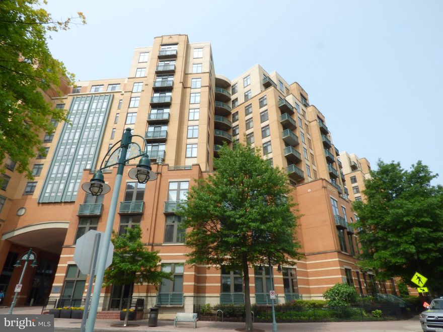 Opportunity to live in the heart of Shirlington Village. One bedroom with a large office/den space, and large balcony area with a breathtaking view of Arlington, Four Mile Run creek, Jennie Dean Park, and the Washington Monument. Strategic location close to Reagan Airport and Union Station for international and domestic travel. Enjoy the convenience of the resident gym, pool, and private outdoor area. Unit includes a private parking space (large corner location) and additional storage, both on the 3rd level. 

The Village at Shirlington offers an abundance of dining options - Dudley's Sports Bar, Carlyle, Copperwood Tavern, Guapos, Palette, and Jenis ice cream to name a few. The community also has an AMC Movie Theater, Hilton Hotel, Harris Teeter, and Arlington Public Library.