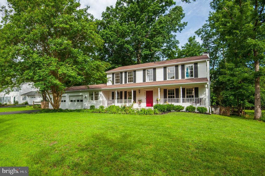 Do not miss this one!  A perfect 10!  Lots of great updates including a 2 year young STUNNING kitchen with white custom cabinets, huge island, stainless steel appliances and granite countertops. the exterior siding is even newer! Designer paint throughout and recent bath renovations with gorgeous quarts countertops. The main level has lovely wider plank hardwood flooring throughout - also within the past 2 years. Lots of recessed lighting and a giant Laundry/mudroom. The gorgeous front porch has custom tongue and groove wood accents. Newer windows, roof and HVAC! HUGE unfinished basement waiting for your touches! Walk up to a fabulous backyard - the lot is over a half acre! Less than 1/2 mi to the upcoming metro stop at the corner of Fairfax County Parkway and the Dulles toll Road. this one has it all!