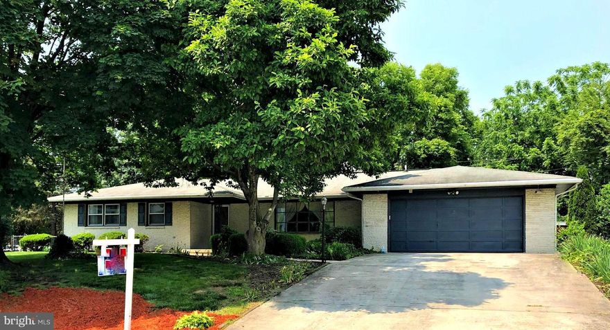 Charming custom Rancher in Hagerstown, MD! 3 beds, 2.5 baths.  4,442 sq. ft.  Gleaming hardwood floors throughout (3/4  solid hardwood &    maple flooring).  3 fireplaces (2 woodburning/gas, 1 gas).  Huge family room with exposed brick wall and wood ceiling.  Bright living room/dining room combo.  Beautiful Kitchen -- three convection ovens, garbage disposal, dishwasher, triple bowl stainless steel sink, stainless steel refrigerator with ice maker - cabinets are solid maple doors and frames.  Master bath with beautiful cabinets and walk-in shower. Finished basement with wet bar, large rec room, and storage space.  Stackable Washer and Dryer are included. New Pella Wood Windows & Patio Door.  Fenced-in patio.  Attached 2 car garage and Storage Shed.  Two heating systems and two septic tanks.  Located right off Rt. 40 near several restaurants and stores!