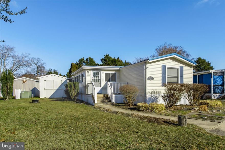 This charming 2-bedroom, 2-bath home is full of curb appeal and truly move-in ready. Step inside to a bright and spacious three-season sunroom, surrounded by windows that fill the space with natural light—perfect for morning coffee, relaxing afternoons, or entertaining guests. The windows were replaced in 2020! The interior features an open and inviting layout that had a major renovation by the previous owner in 2020. The living area flows seamlessly into the kitchen and dining space, creating a nice, open setting for everyday living. Beautiful vinyl plank flooring connects the spaces. The updated kitchen offers stainless steel appliances, newer cabinets and countertops, and plenty of workspace. Both bedrooms are generously sized with ample closet space, and the updated bathrooms add to the home’s fresh, well-maintained feel. Outside, enjoy multiple spaces designed for outdoor living, including a unique and private backyard patio and deck, ideal for entertaining or unwinding after a day at the pool or beach. Beautiful landscaping enhances the setting, and a large shed provides convenient storage for a golf cart and more.

Major updates include a roof replaced in 2016 and central air installed in 2018, offering peace of mind for years to come. Located in the desirable waterfront community of Angola Beach, this home is just a short walk or golf cart ride to the Community Recreation Area featuring one of two community pools, tennis, pickleball and basketball, the marina, boat ramp and fishing/crabbing dock, playgrounds and more—perfect for enjoying coastal living. Angola Estates is a leased land community, with rent that conveniently includes trash and sewer. Residency application required for purchase; includes a credit check and background check. Whether you’re looking for a primary residence or craving a beach getaway with that easy coastal lifestyle, this home checks all your boxes.