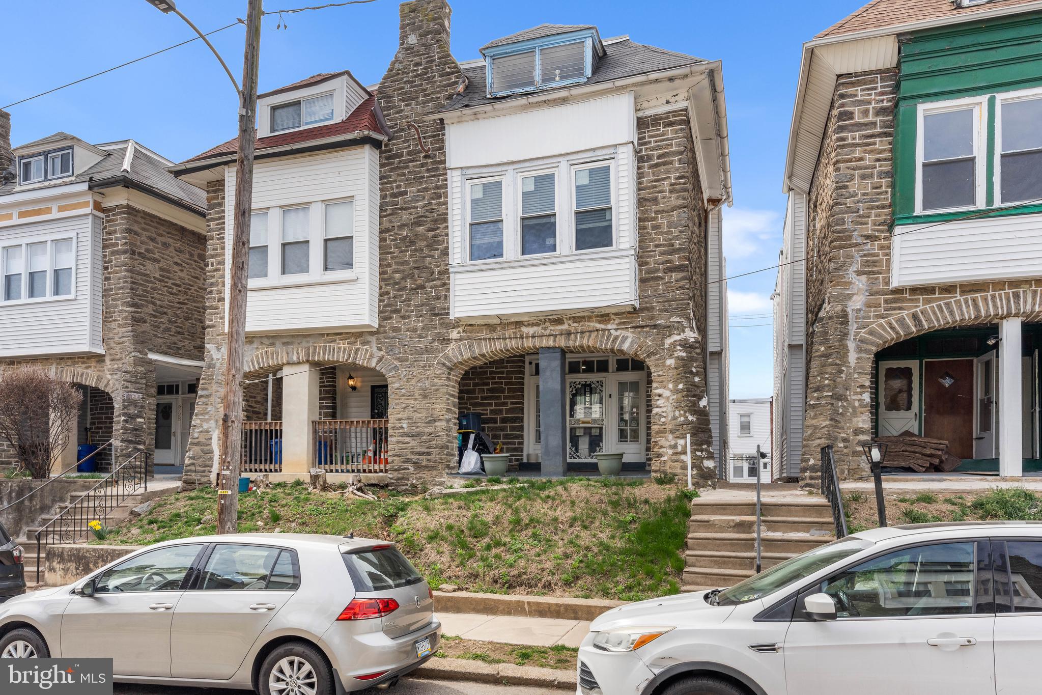 Welcome to 6732 Sydenham St in West Oak Lane!
This bright and charming twin features spacious bedrooms, a finished basement, and parking.
Out front there is a sweet stone porch to enjoy your morning coffee. Inside is a large living room with mantle, leading you back to the dining room and updated kitchen. There is a powder room on this level.
Upstairs on the 2nd floor are 3 spacious bedrooms and a full bath. Each room has plenty of closet space as well. The third floor walks up into a single room with another closet, rounding out the 4th bedroom. The basement is finished and has laundry. The garage is built in to the basement, and you can walk out to the alley parking from this level.