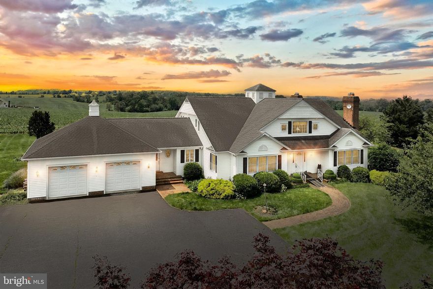 Northern Baltimore County in the Hereford Zone! Nestled on a sprawling 114+ acre estate, overlooking the picturesque fields and pastures, this custom-built farmhouse is the perfect blend of elegance and rustic charm. Designed with attention to detail and a timeless aesthetic, this property is the ideal sanctuary for those seeking to escape from the hustle and bustle, while enjoying the modern conveniences in a serene setting. Each room was crafted to combine functionality and beauty, seamlessly blending rustic charm with contemporary finishes. Large windows allow natural light to flood the interiors, offering picturesque views of the surrounding acreage. The farmhouse features gleaming hardwood floors that extend throughout the living spaces on both floors, lending warmth and sophistication. In cooler months, radiant heated floors bring unparalleled comfort and coziness, making every step a delight. This home boasts five generously sized bedrooms with a primary owner’s suite on the main level as well as the upper level. With closets galore offering more than ample storage space throughout the home. Cozy up by one of the fireplaces or unwind on the back porch overlooking peaceful countryside views. The expansive basement is a blank canvas awaiting your imagination and creativity. Endless potential for adding a rec room, home gym or theatre, or additional living space to suit your needs. There is an attached two car oversized garage with heat and generous storage.   Extensive landscaping and lush lawn surround this farmhouse as you relish nature’s beauty.  **This property encompasses an Agricultural Land Preservation Easement. There is a current Crop Lease for the 77.5 tillable acres in effect until November 2026** With a perfect balance of modern sophistication and rustic charisma, this farmhouse is more than a home, it's a lifestyle. Schedule your private showing today and discover the warmth and charm of this delightful home!