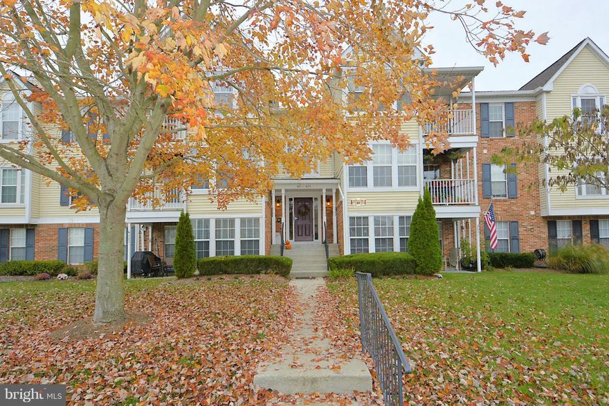 Showing for Back Up Contracts!-- Light and Bright 2 BR, 1 BA Top Floor Condo with Newly Updated Kitchen with Granite Counters, SS Appliances and Wood Flooring.  Love the Abundant Windows and Cathedral Ceilings,  Relax on your Private Deck.  Enjoy the Community.  Convenient Commute Location.  Windows, HVAC & Hot Water Heater Updated within the Past 5 Years. Abundant Parking.   Welcome Home!