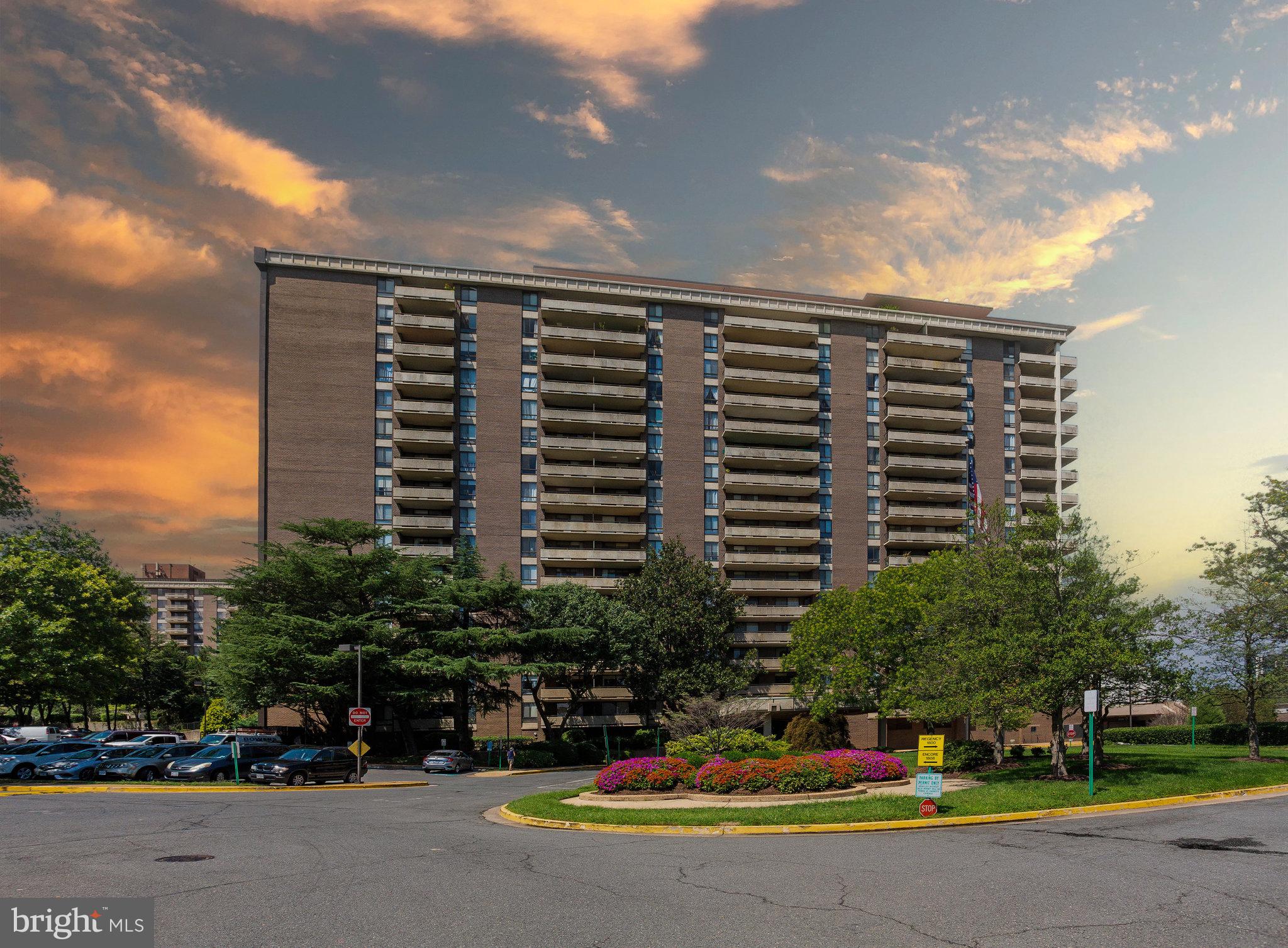 Welcome to this nicely updated condo on the top floor at The Regency at Mclean. With 1,338 square feet of living space, this 2-bed, 2-bath residence is filled with natural light all day. As you step inside, you'll immediately notice the unique advantages of this top-floor location — it is on the quieter side of the building and there are no neighbors above you, which provides ultimate privacy and a peaceful living environment with lovely views. <br><br>
The condo has upgraded engineered hardwood floors in the foyer, the dining room, and the living room. The living room offers a comfortable environment with new sliding doors leading to a generous balcony, where you can enjoy the views of Tysons Corner and McLean's skyline, creating the perfect spot for relaxation or savoring your morning coffee. <br><br>
The remodeled kitchen is a culinary delight, featuring updates like maple cabinetry, granite countertops, a glass tile backsplash, ceramic floor tiles, and stainless-steel appliances. It's a space that combines functionality with beauty, offering ample countertop space and room for a breakfast table. <br><br>
The primary bedroom suite has a walk-in closet with custom built-ins and a secondary closet with ample space. The ensuite primary bathroom has a stand-in shower, an upgraded vanity, beautiful floor and wall tiles, and contemporary light fixtures. The second bedroom is equally welcoming, boasting generous dimensions and wall-to-wall closet space. The second bathroom is thoughtfully updated and practical, including a stackable washer-dryer for convenience. The condo has a garage parking space and a storage space. And the condo fee includes all utilities! <br><br>
Throughout the home, you'll notice the meticulous attention to detail, from the high-end finishes to the thoughtful layout. It's a place where elegance, comfort, and style effortlessly converge to create a harmonious living space. <br><br>
The Regency at McLean is a gated community with many amenities, including 24/7 staffed front desk, controlled access, 3 outdoor pools, a library, a convenience store, a hair salon, and grill areas outside. For fitness enthusiasts, there is indoor access from the building to the state-of-the-art OneLife Fitness facility next door, complete with many exercise classes and even a delightful restaurant. The location is truly unbeatable, with easy pedestrian access (bridge) to Tysons Corner Mall and within proximity to grocery stores, including Wegman's, and the McLean Metro station. Quick access to the Beltway, Rt 66, GW Parkway, and Dulles Toll Road makes commuting easy. <br><br>
If you're searching for a move-in ready home that not only offers luxury but also boasts a convenient location in the hub of McLean and Tysons Corner, this remodeled condo on the top floor has it all. Don't miss the opportunity to make this your new home and experience the charm and functionality of this exceptional residence.