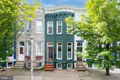 Photo of 849 W 35th St, BALTIMORE, MD 21211 (MLS # MDBA2194840)