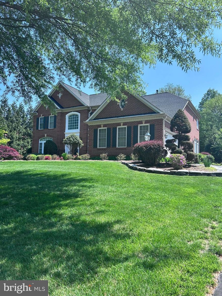 SITE UNSEEN offer accepted. 
Discover timeless elegance in this stately 4-bedroom brick Colonial, located on a serene cul-de-sac in the distinguished Bellmeade II community—just minutes from Tysons Corner. One of only ten exclusive homes in this enclave, it resides in one of McLean's most prestigious and conveniently located neighborhoods. Situated on a premier lot, this Knightsbridge model by NV Homes was built in 2003 and offers over 7,000 square feet of thoughtfully designed living space across three levels. Step into the impressive two-story foyer, where an open staircase is flanked by a formal living room and an elegant dining room. The expansive family room boasts floor-to-ceiling windows that overlook the private, tree-lined backyard, filling the space with natural light. The updated gourmet kitchen (renovated in 2025) is a chef’s dream, featuring all-new, top-of-the-line Bosch appliances. Adjacent to the kitchen, the sunroom dazzles with Palladian windows and new flooring, offering a bright and airy retreat. A spacious home office, a powder room, and a laundry/mudroom with access to the 3-car garage complete the main level. Upstairs, the luxurious owner’s suite includes a sitting area, tray ceilings, two oversized walk-in closets, and a spa-like bathroom with dual vanities, a jetted soaking tub, and a separate shower. Three additional bedrooms, each with walk-in closets and en-suite bathrooms, complete the upper level. The light-filled, walk-up basement is an entertainer’s dream, offering ample space for a billiards table, media lounge, or customized recreation area. The HOA fee includes weekly landscaping (mowing and trimming), fall leaf cleanup, lawn aeration, and more. Zoned for Spring Hill Elementary, Cooper Middle School, and Langley High School—this is truly a special home. Easy access to Dulles Toll Road and 495. A must-see!