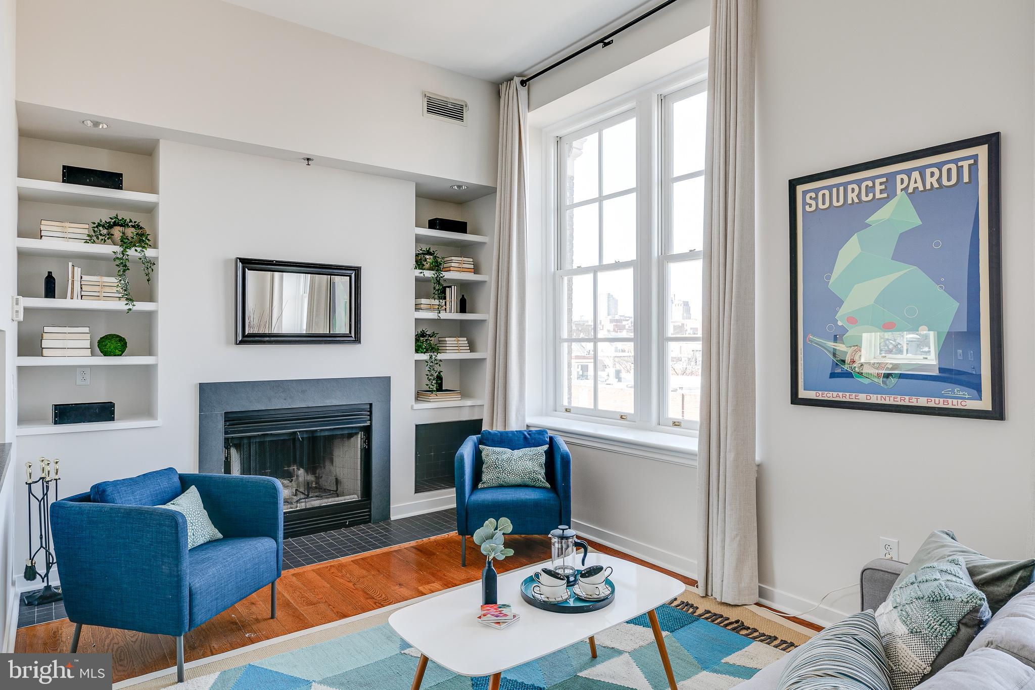 Welcome to this sunny and bright 3rd floor unit located in the vibrant Queen Village neighborhood. This charming unit offers a perfect blend of modern comfort and historic charm, making it an ideal choice for those seeking a stylish urban retreat. As you step inside, you will be greeted by a spacious and secure vestibule that leads you up to this charming residence. The interior features beautiful hardwood floors that add warmth and character to the space. Sunlight floods the rooms through large windows and high ceilings, creating a bright and inviting atmosphere throughout. The cozy living area comes complete with a wood burning fireplace that serves as the focal point of the room. This is the perfect spot to unwind after a long day or entertain guests in style. The open layout seamlessly connects the living area to the dining space, providing a versatile setting for both intimate dinners and lively gatherings. The kitchen comes equipped with modern appliances, ample cabinet and countertop space. The primary bedroom offers a serene and comfortable space to retreat to at the end of the day. The second bedroom can be used as a guest room, home office, or whatever suits your needs. Outside, you'll find a large staircase that leads to the main entrance, providing a grand and elegant welcome to your home. The building also features an elevator for easy accessibility. One of the highlights of this property is its prime location. Situated in the heart of Queen Village, you'll have a plethora of shopping, dining, and entertainment options right at your doorstep. Explore the vibrant local scene, indulge in the diverse culinary offerings, and enjoy a night out at the nearby bars and restaurants. For those who commute, this home offers easy access to major highways such as I-95 and I-76, making your daily travels a breeze. Schedule your private showing today and experience the best of Philadelphia living in this exquisite home.