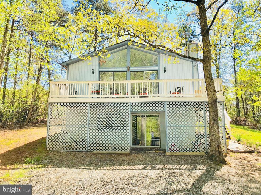 ***MOVE-IN READY***Raised rambler with large open concept living, dining, and kitchen with cathedral ceilings and picture windows.  4 bedrooms and two baths with separate basement den.Large deck for entertaining off living area. Storage Shed in back. Beautiful Gated Community offering many amenities...Clubhouse, Pool, Lake, Boat Ramp, Fishing, Swimming and much more! HOME PRICED TO SELL FAST