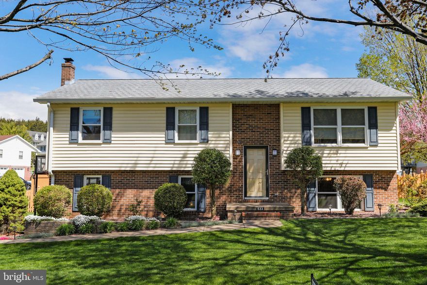 Discover this charming split foyer home located in the heart of a quiet, established neighborhood.
This spacious four-bedroom home has plenty of room and space for home offices. Three bathrooms ensure ultimate convenience, and the converted garage makes for a great man-cave, workshop area or game room.

The open kitchen offers plenty of space for more than one cook, and the adjoining dining area sets the stage for memorable gatherings. The spacious deck just off the kitchen allows for even more room to have friends over for special occasions.

Thoughtfully placed upgrades include solid wood 6-panel doors in all the rooms and bathrooms, brushed nickel lever door handles, and mirrored closet doors. Soft-close kitchen cabinets mean you can get a midnight snack without disturbing anyone else in the home.

Outside, enjoy the beauty of nature with the fenced-in backyard, with lush green grass perfect for playing in the yard. Fancy yourself a small garden? You'll enjoy the six raised bed garden boxes to plant your favorite fruits and veggies. If you’re feeling sociable, you’ll be able to wave to neighbors and passersby as you sit out front enjoying the beautiful landscaping.

The 10' x 16' shed offers additional storage space, as does the area beneath the deck, perfect for storing your lawnmower and gardening tools.
This home is a peaceful retreat, while being close to many amenities. Welcome home to a life of comfort and convenience.