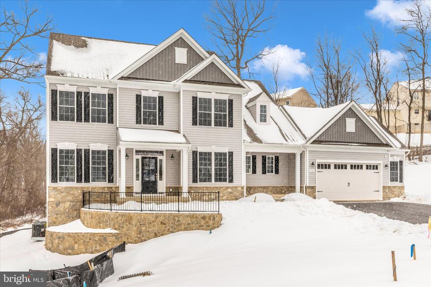 NEW CONSTRUCTION - Over 3,600 square feet - Brand New Home by award winning Forty West Builders. Stunning Colonial on the most desirable homesite in the community.  The homesite is private, backs to forested parkland and includes a tranquil streem. {{.}} Beautiful Oak stairs greet you as you enter the home. 9' ceilings on all levels, coffered ceiling & fireplace in family room. The kitchen features upgraded cabinets, large island, double oven, natural-gas cooktop, and quartz countertops.  Upgraded wide-plank hardwood floors on the main level.  Primary bedroom features walk-in closet, private spa-bath with separate shower, soaking tub and dual vanities. Bedroom level laundry room. The large finished basement includes a full-bathroom, a bedroom, wet bar, and, a large recreation room.  Exterior upgraded to include two (2) porches, stone terraced landscaping,  and a stone water table. {{.}} The two-care garage includes a large 6-foot side-extension that is perfect for a workshop and/or additional storage.