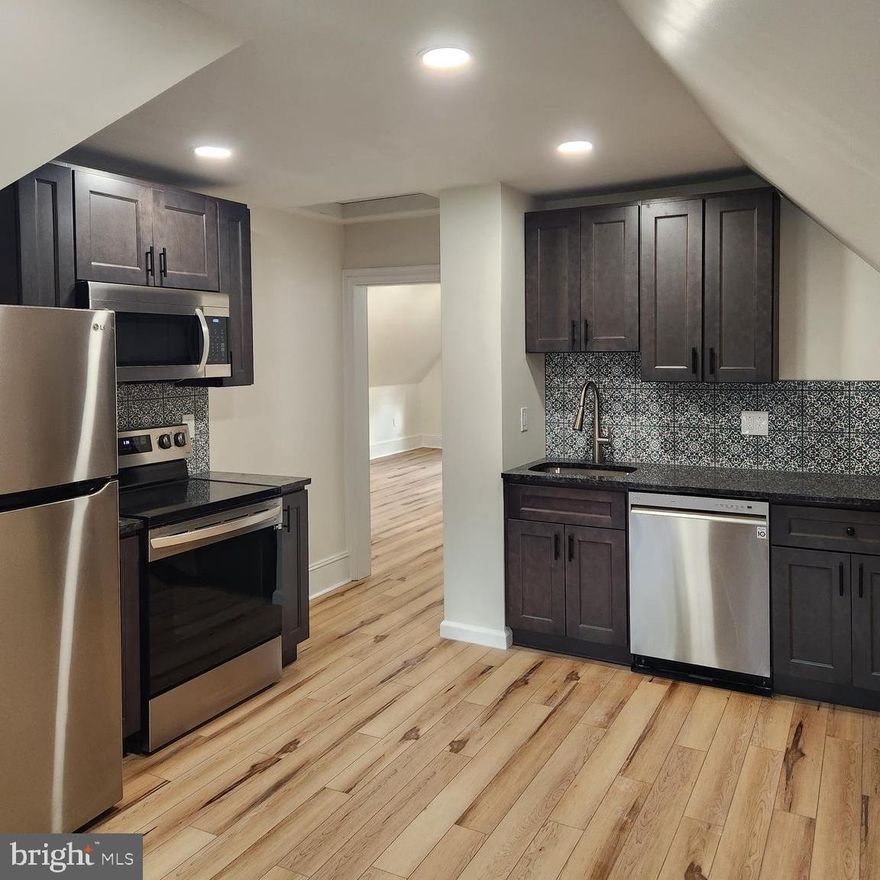 Exquisite 2 bedroom apartment with vaulted ceilings, ORIGINAL early 1900's stained glass and a grand view of Main Street Royersford is AVAILABLE NOW! This 3rd Floor apartment features a large living area, with full size in unit washer dryer, tub shower, and features LED lighting throughout. The kitchen features newer appliances including smooth top electric stove with granite countertops and high end kitchen cabinetry giving you plenty of space for storage and the luxurious feel!  Relax on the breathtaking wraparound front porch!  Located in the heart of downtown Royersford, this apartment can be Pet Friendly for cat(s) or 1 small dog. These new apartments come complete with washer and dryer in unit, central air, high efficiency mini split heat system, new windows, granite countertop, new appliances, tiled shower, luxury vinyl plank flooring, and much more! Safety features include hardwired smoke detectors, plenty of outdoor safety lighting , and security cameras around the property. First floor apartments have separate exterior entrances. All apartments include recessed lighting, cable enabled, and modern amenities. Walking distance to Annamaries, Downtown Restaurant, Handel's Ice Cream, Lost Planet Brewing Co and much more! All leases are 12-24 months in length. Rent amount is $1795 per month and includes water sewer, and trash. Resident is responsible for electric, and FIOS or cable. Security deposit is $1795 and if you have a cat or small dog, there is a $250 dollar pet deposit fee (one time) and $20/per month. Move in will require first, last, and a month's security deposit.  All tenants will be screened by a 3rd party background check service- if you have prior credit issues, we ask that you disclose them upfront. Honesty in the application process is a MUST.  No smoking is permitted in the apartment or on building premises. All residents are required to carry renter's insurance.