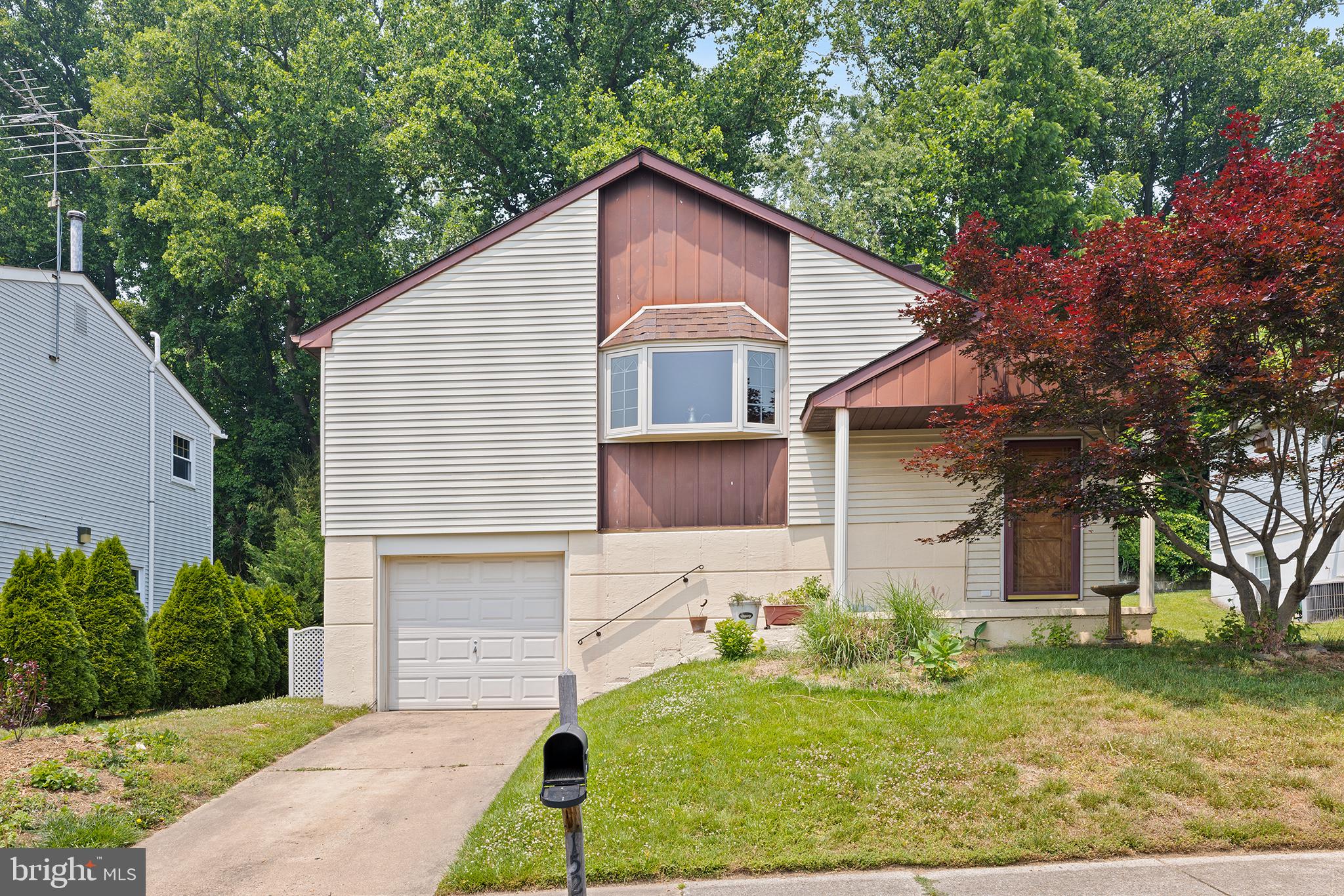 This well-maintained home, nestled in a highly desired neighborhood, is rare opportunity, as the current owner has replaced or upgraded nearly everything during ownership—including the rare addition of a second full bathroom. The main level offers a large, open living and dining area that flows into the renovated kitchen (2015) with a newer oven (2020), along with an extra large Primary Bedroom, a secondary bedroom and a full bath. The walkout basement with newer flooring features a cozy family room with a wood-burning fireplace, a third bedroom, and an additional full bath. The roof was replaced in 2009 with a 30-year warranty, as well as a newer AC unit (2021), and hot water tank (2018). All interior doors and the front door have also been replaced, adding to the home’s fresh, updated feel. Schedule your showing today to see all that this special home has to offer! *Mortgage savings may be available for buyers of this listing.*
