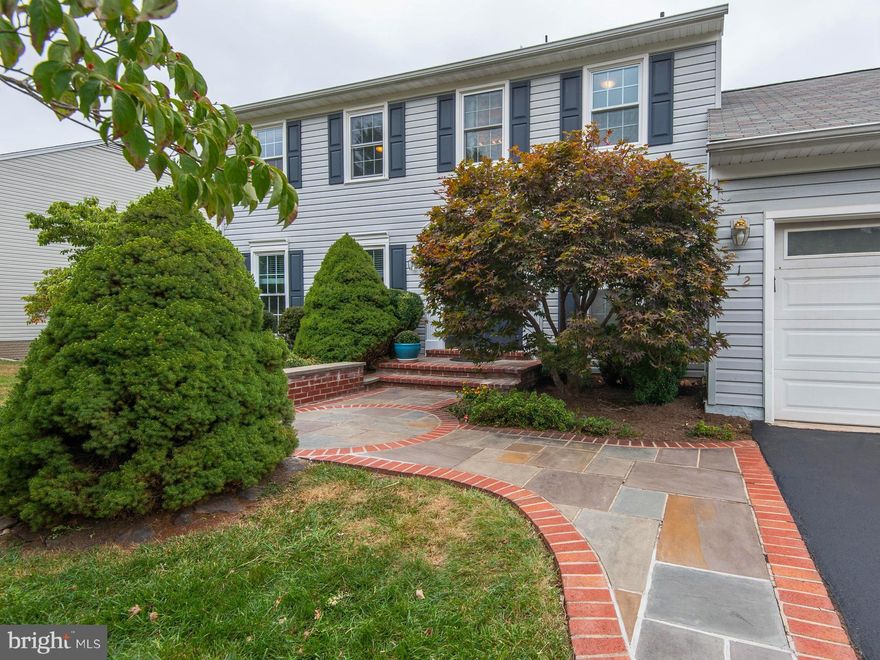 Fantastic location! Vaulted ceilings in FR, Wood burning FP, 3 levels wood floors,Extensive crown molding, finished garage, Home Theater w/motorized screen &  surround sound, Multi level deck w/ built in seating & private, wooded view. Flagstone front walk, vinyl windows throughout, granite countertops, recessed lighting, wainscotting/chair rails in DR, ceilng fans. Main level W/D.