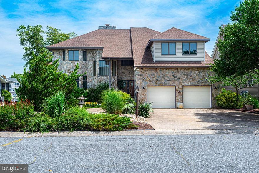 single family home in ocean pines community, waterfront with a extra wide canal, minutes to the bay. Stone front with a large circular driveway. Landscaped with a fish pond with running water features. Community has 5 swimming pools, golf course, Yacht club and restaurant, golf club house. Ocean pines has its own police and fire departments. Close to great medical facilities.