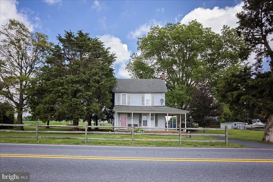 HERE IS AN OPPORTUNITY TO OWN A PIECE OF DORCHESTER COUNTY HISTORY! THIS CHARMING HOME HAS STRONG BONES AND ENDLESS POTENTIAL, LOCATED ON NEARLY 0.7 ACRES ACROSS TWO PARCELS- ONE WITHIN TOWN LIMITS (0.463 ACRES) AND AN ADDITIONAL 0.23 ACRE COUNTY PARCEL. THIS 2-BEDROOM, 1 BATHROOM HOME FEATURES A VERSATILE SPACE THAT CAN EASILY BE CONVERTED INTO A HOME OFFICE OR STUDIO. ALSO, AN UPPER-LEVEL SITTING ROOM THAT COULD EASILY BE USED AS A THIRD BEDROOM. WHILE THE PROPERTY DOES NEED SOME TLC, IT OFFERS THE PERFECT CANVAS FOR RENOVATION OR INVESTMENT. A FUNCTIONAL LAYOUT, AND AMPLE OUTDOOR SPACE MAKES THIS A RARE FIND WITH ROOM TO GROW! MOVE IN AND WORK ON THINGS AS YOU CAN!