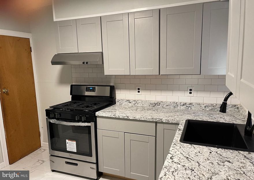 Newly Renovated interior home on quiet block.  This home features spacious rooms with an enclosed porch/foyer, living room and full formal dining room.  Newly renovated kitchen with new cabinets, countertops and beautiful ceramic floors.  New stainless steel appliances included.  Fully renovated bathroom with new bath, sinks and beautiful ceramic flooring. Three spacious bedrooms with plenty of closet space.  Plush carpeted floors throughout second level hallway and bedrooms. Full basement with laundry hookup, perfect space for extra storage.  Nice sized patio in backyard great for grilling and relaxing outdoors. Available Immediately. Must See!