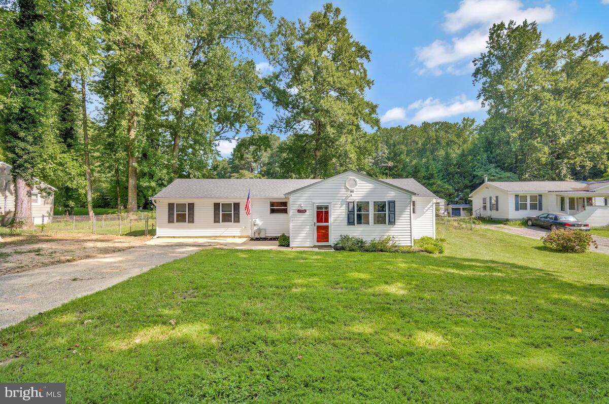 This charming one-level home checks all the boxes—and then some! From the moment you step inside, you’re greeted with a flexible space perfect for a cozy sitting area, playroom, home office, or mudroom—the choice is yours!
Inside, you'll love the freshly installed luxury vinyl plank flooring that flows throughout, giving the home a clean, open, and modern feel. The kitchen is airy and bright, thoughtfully designed with a unique step-up that subtly separates it from the living area while still maintaining that sought-after open-concept vibe.
The owner’s suite is a true retreat, located on its own private wing of the home. Complete with a spacious walk-in closet and a full private bath, it offers just the right amount of separation and tranquility. On the opposite side of the home, you’ll find two additional bedrooms and a second full bath—perfect for guests, kids, or roommates.
Step outside and discover your entertainer’s dream backyard! The large, fully fenced yard offers room to play, relax, garden, or host unforgettable cookouts. A sizable shed and lean-to offer excellent storage for tools, bikes, and weekend projects.
With a complete renovation in 2005 and numerous upgrades since, this home is truly move-in ready. Enjoy peace of mind and low maintenance for years to come!
🏡 USDA 100% Financing & VA Eligible
💸 Perfect for First-Time Buyers/Single Story Living/Summer Beach Getaway
💫 This one is a solid 10—come see for yourself!
Don’t miss your chance to own this gem—schedule your tour today and make it yours before someone else does!
