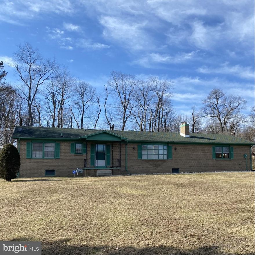 All brick 1,795 sq. ft. rancher on 1.11 acre lot. Spacious kitchen. Master bedroom with full bath. Large living room with wood stove.  Unfinished basement and 2 car garage.