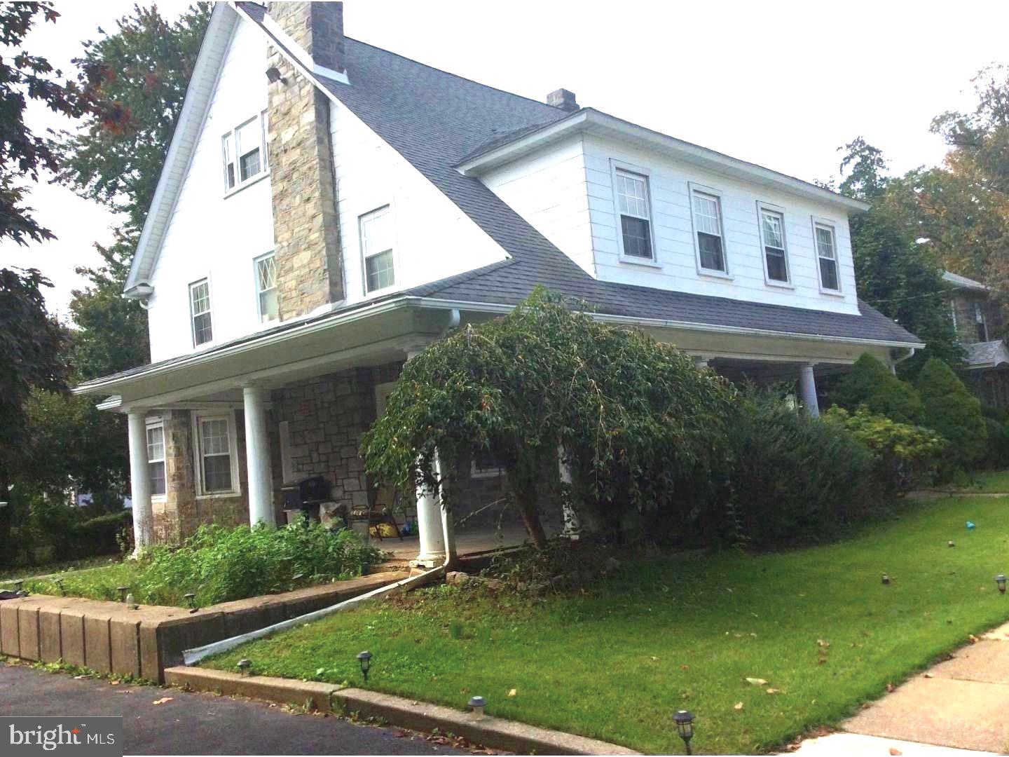 This is an exceptionally large single-family house. On a large corner triangle lot . Five bedrooms two full & a half (2.5) bathrooms.Absolutely one of Delco's Finest locations. Located in The Drexel Hill & situated on a nice tree-lined street. Fenced in backyard on a corner lot with 2 large detached garages and driveway will Absolutely Blow Your Mind Away! This house located on a nice quiet street will greet you with a graceful, open-air, wrap-around porch providing relaxation in the shade. The glass front door with sidelights opens up to a foyer and grand staircase. On first floor You will enjoy an open living room with a stone fireplace and adjacent dining room,The kitchen with plenty of space and an adjacent powder room. Some newly installed windows hardwood/laminated floors. Upstairs the master suite comes equipped with new bathroom with granite floors, oversized jacuzzi tub, separate jet stream shower and 2 walk-in-closets and study or child room. The large hall bathroom is also with a new shower and separate tub. The 4 th & 5 th bedroom can be in the large partially finished attic. This house has hardwood/laminated flooring but need some cosmetic. The 2nd floor has two nice size able bedrooms with newer full bathroom. Both bathrooms have all around ceramic tile on walls and floor. This house is located 15 minutes from Center city and Philadelphia. International Airport. Close to trolley & bus stop, school and stores. private driveway for 4-6 car parking Nice fenced-in back and side yard. Central air conditioning on first floor only. ,One YEAR HOME WARRANTY included with a full price offer.