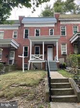 Situated on a lovely tree-lined street this charming three-bedroom Beechfield home features spacious living areas, new appliances and two fantastic outdoor porches * New flooring throughout* There is a finished room ,laundry and half bath in the basement* Basement walks out to a full size back yard* Convenient to Catonsville and Downtown Baltimore* Come see for yourself what this home has to offer* Seller has maintained mechanical throughout ownership* Make this one yours* Sold as-is but in good condition ! Cash offers preferred* No traditional FHA or VA will work