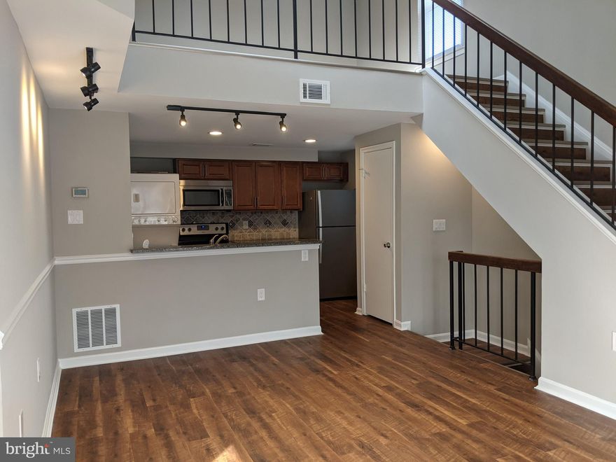 ***Exceptional Two Bedroom w/ Loft, End-Unit Condo in Fort Belvoir Area of Alexandria *** *** The natural light is amazing with skylights throughout and open living space *** Recently renovated (2016), 2 master BRs w/ full, updated baths (March 2021) and walk-in closets, NEW windows (2018), fresh paint (March 2021)1094 s.f. living space. Fully updated kitchen (2016) with SS Whirlpool appliances, granite counter, recessed & track lights, wood floor on all levels, cathedral ceilings, fireplace, floored attic for storage, washer & dryer in unit. Assigned parking space w/ 2 additional parking tags. Very well-maintained condo, sold AS-IS. LLC’s owner is a licensed Realtor/agent in Virginia.