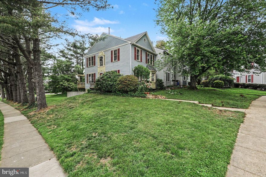 Beautifully updated light-filled end-unit townhome in a prime location with privacy and exceptional walkability to grocery stores, dining, and shopping. Recent improvements include a new roof (2026), new windows, hot water heater, flooring, and stainless steel appliances (2023). Private side entrance leads to a dramatic two-story foyer and spacious family room opening to the deck. Bright eat-in kitchen with bay window plus additional front-load washer for added convenience.
The walk-out lower level offers incredible flexibility with a wet bar complete with sink, and extensive counter space, along with a full bath, bedroom, laundry room, and additional living area potential.
Gas fireplace currently not used is behind the tv shelving unit