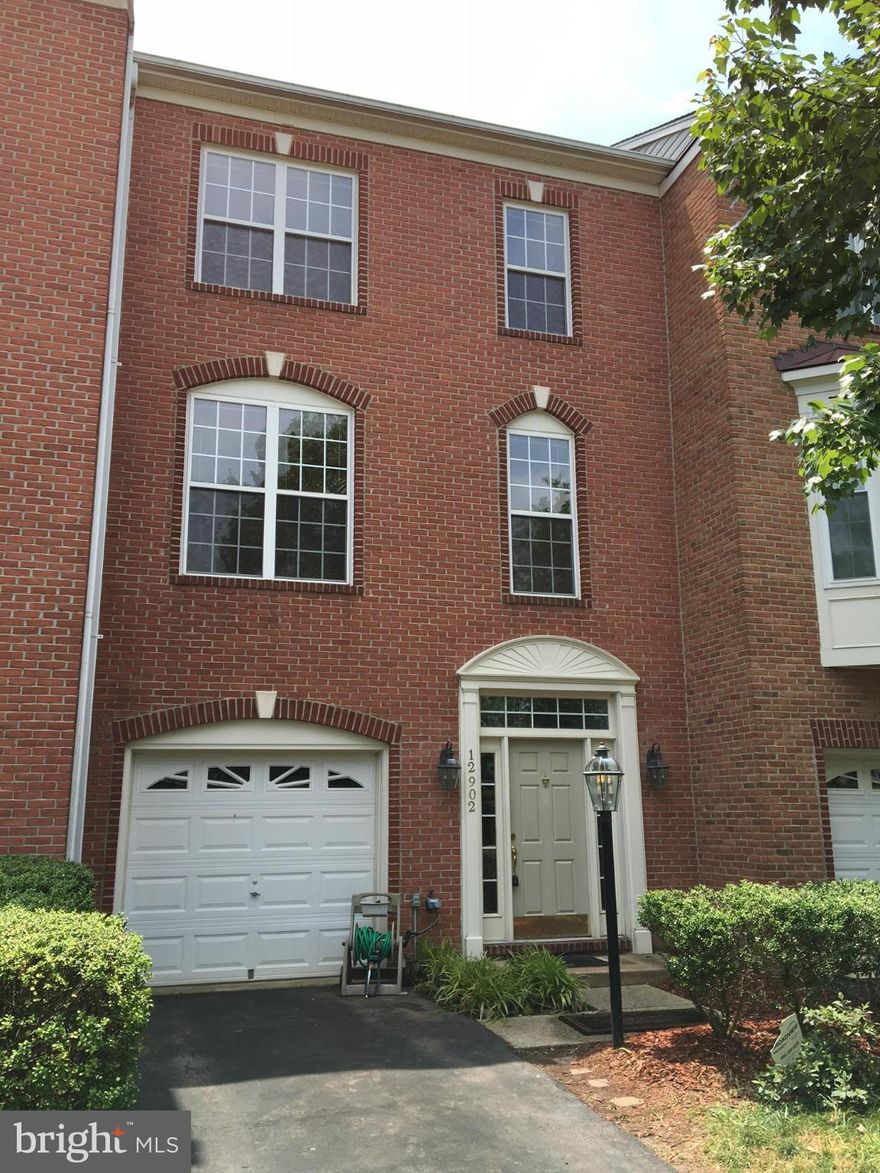 Lovely Bright 3 Bedroom/ 3.5 Bath Brick Front Townhome w/3 Level Bump out in Woodland Park. New Paint. Hardwoods. Large Kitchen w/Family Room and Breakfast Room. Large Main Bedroom with Full Bath and Walk-In Closets. Rec Room w/FP and Full Bath. Den or 4th Bedroom in Lower Level. Deck off Kitchen. Fenced Yard. Backs to woods. Convenient to Shopping, Commuter Routes, and Metro. No Pets, No Smokers. $50 Application Fee per Applicant.