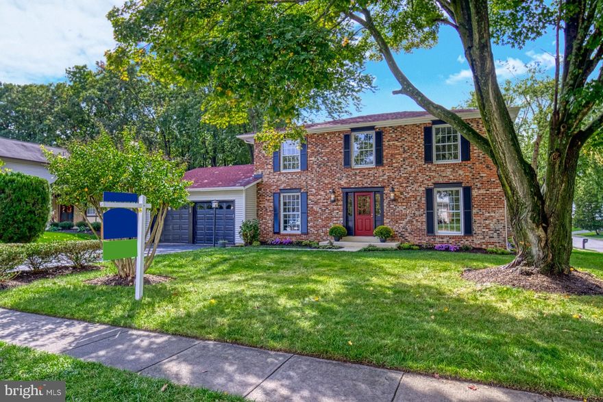 Charming 3-level traditional Colonial home sits on  .22 acres with a fenced rear yard in Longwood Knolls.   A light-filled home with 4 bedrooms plus 2 bonus room/dens offer you the flexibility for home office, home school space etc.  Features of this home include: Eat-in Kitchen with granite countertop and a center island with new kitchen appliances: Dishwasher, Refrigerator, Stove, Microwave (2020).  Off the kitchen is the first of the two bonus room/den with access to the deck.  Family Room with exposed brick wood-burning fireplace opens to a large deck with built-in seating,  Living Room and Dining Room overlooks the manicured front yard, Generous Primary Bedroom  has 2 walk-in closets, Finished basement boasts full bath, Storage Room, Bonus Room/Den and a large Recreation Room with Built-In Shelving.   Updates include:   New LVP flooring (2020), New carpet (2020),  All of the interior painted as well as the exterior shutters & garage doors (2020),  New Fence (2020), New Water Heater  (2020), Deck stained (2020), Roof (2016),  Furnace (2011), A/C Condenser (2020).  This home feeds to Cherry Run! You have the convenience of being close to Burke Park, Shopping and Restaurants.  Slug Line is @ Burke Town Plaza,  approx.: 8 minutes to VRE,  approx.: 15 minutes  to Springfield Metro.