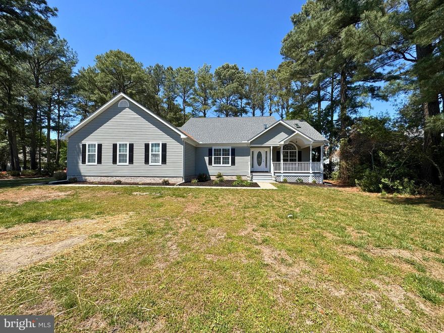 Move right in to this beautifully renovated 4-bedroom, 2.5-bath home offering over 2,600 square feet of comfortable living space on a spacious corner lot. Recent upgrades include a brand-new roof, new HVAC systems, luxury vinyl plank flooring, updated lighting, fresh paint, and stylish new bathroom vanities throughout. The kitchen features gorgeous quartz countertops, stainless steel appliances, and a sunny breakfast area that flows seamlessly into the large, light-filled sunroom, creating the perfect space for everyday living and entertaining. The spacious great room showcases vaulted ceilings and plenty of natural light.
The first-floor primary suite offers convenience and privacy, with a large bath featuring tile flooring, a jetted tub, and a separate shower. One of the home’s standout features is the oversized laundry room/butler’s pantry — a versatile space with endless possibilities for storage, prep space, hobbies, or entertaining. Enjoy outdoor living on the generous screened porch, ideal for crab feasts, outdoor dining, or relaxing evenings. Upstairs, you’ll find three additional bedrooms, a full bath, a loft area, and walk-in attic storage. Additional highlights include an oversized 2-car garage and a welcoming covered front porch. This move-in-ready home truly has it all!