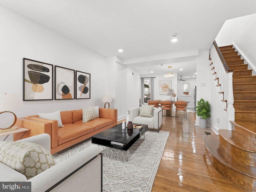 Discover this meticulously renovated 3-bedroom, 1.5-bathroom townhome in Philadelphia's sought-after Wynnefield community, 5448 W. Montgomery Ave. The open and airy floor plan is perfect for modern living, highlighting stunning original hardwood floors and recessed lighting that illuminate the space. The completely updated kitchen is a culinary dream, equipped with sleek gray shaker cabinets, a striking mosaic blue tiled backsplash, durable quartz countertops, and brand-new stainless steel appliances. Subtle blue accents are thoughtfully integrated throughout the property, from the charmingly landscaped front yard to the newly designed, contemporary full hall bath. Its prime location provides unparalleled access to nearby stores, restaurants, and Saint Joseph’s University, with easy access to major roads like City Avenue and scenic Kelly Drive. Enjoy a quick and easy commute to Center City Philadelphia, making this an ideal home for anyone looking for convenience and sophisticated design. Make 5448 W. Montgomery Ave your new home,  schedule your private tour today!