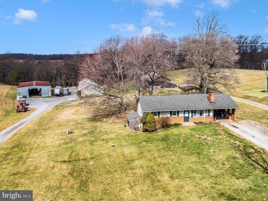 Nestled in the heart of rural Southern Carroll County,  this 18+ acre property offers a rare blend of tranquility, opportunity, and convenience. Surrounded by scenic unencumbered acreage, the property features 3 dwellings and multiple large outbuildings  providing boundless potential for income or multi-generational living.   The homes are modest in style and condition but offer the perfect canvas for customization and opportunity.   
This property is a haven for those with agricultural aspirations. Whether you're envisioning a thriving crop farm, an equestrian facility for personal  or business,   a family 4-H/ private homestead  or simply a   peaceful country retreat,  the possibilities here are as vast as the land itself. The outbuildings add to the versatility, ideal for storage, workshops, or expanding your farming operations.
Beyond the property's serene rural setting, it benefits from proximity to nearby conveniences. You can enjoy the peacefulness of country living without sacrificing easy access to shopping, dining, and essential amenities.     This rare to the market property is a retreat from the hustle and bustle of modern life.
For those with a vision and a dream, this property offers endless possibilities. Whether you're an aspiring farmer, an investor seeking income potential, or someone who simply desires a slice of paradise in Maryland's countryside, this special 18 acre property is waiting to be the backdrop of your next chapter.  

Seller is in process of having a boundary survey completed to confirm property lines and inclusion of the small farmhouse fronting Gillis Falls Road. 

Existing tenants interested in continuing their month to month leases.   Please DO NOT enter property without an appointment.