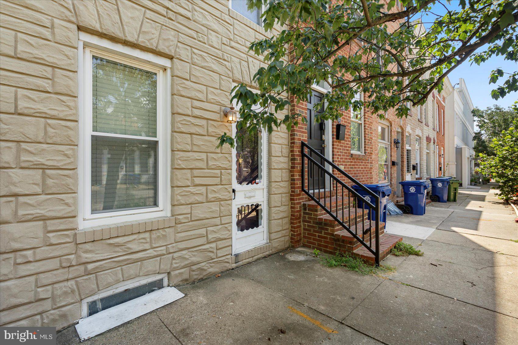 Nestled in the heart of Canton, this beautifully maintained 2-bedroom, 2-bath rowhome offers the perfect blend of modern comfort and city convenience. Just steps from the area's best restaurants, boutique shops, waterfront parks, and nightlife, this home puts you right in the middle of it all. Commuters will appreciate easy access to major highways and public transportation.
Inside, the open-concept main level is ideal for both entertaining and everyday living. The bright and spacious living room features gleaming hardwood floors, recessed lighting, and ceiling fans, creating a warm and inviting atmosphere. The kitchen offers ample counter space and cabinetry, making meal prep a breeze. A laundry area conveniently located on the main level adds to the home’s functional layout.
Upstairs, you'll find two bedrooms along with a second full bathroom. Step outside onto the private back patio, a cozy space to unwind, grill, or entertain. For a more elevated experience, head up to the second-level deck, where you can enjoy peaceful city views with your morning coffee or evening drink.
Move-in ready and ideally located, this home is a true Canton gem. Don’t miss your chance to make it yours—schedule a tour today!
