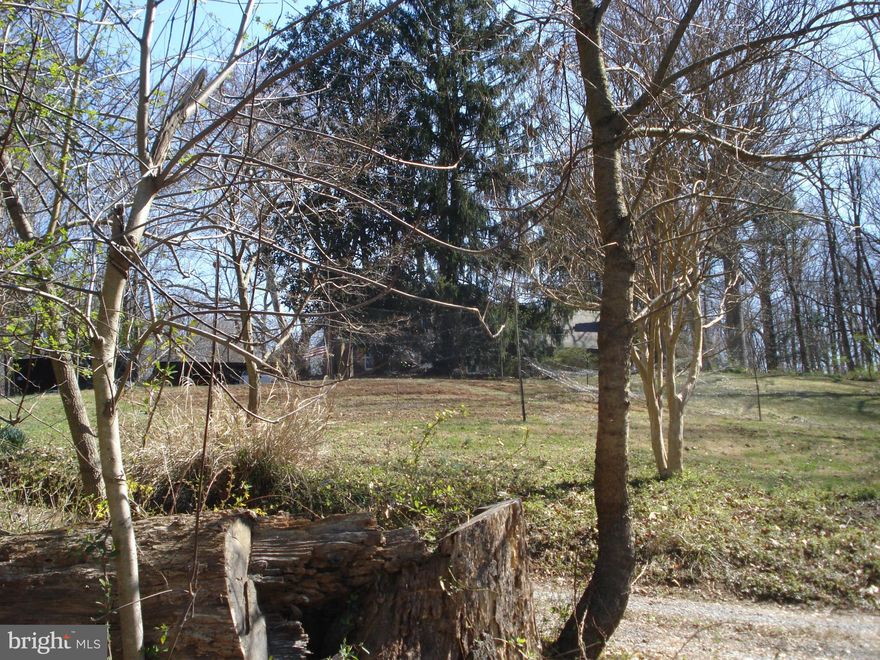 Spectacular 10 acre parcel minutes from downtown Vienna.  1925 vintage brick and log home is livable (tenant occupied) but sold AS IS.  The value is in the land.  Lot is subdivided into two five acre parcels and not further sub-dividable. Property also listed under land and also as two separate parcels - lot with house at $700,000 lot only $550,000.  Plat and engineering information in DOCS
