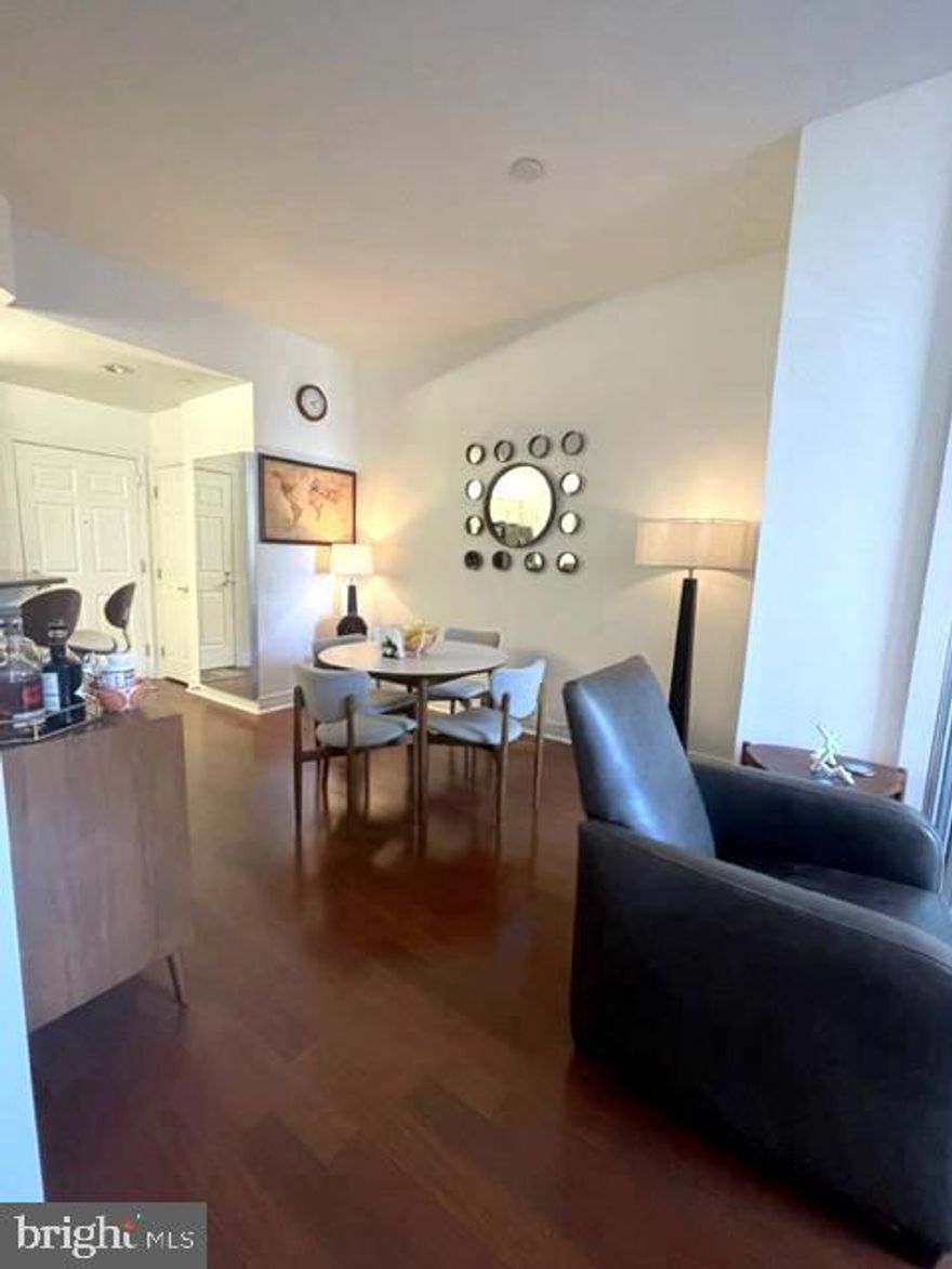 Welcome to The Phoenix. This grogeous one bedroom with fabulous view of The Benjamin Franklin Parkway boasts gorgeous hardwood floors, open chef style kitchen with great added storage with front load washer/ dryer. The primary bedroom features a large walk in closet and great space.  Ample space in the bath with upgraded vanity and beautiful tile floor and backsplash. The Phoenix is a five star amenity building with 24/7 concierge, fitness center, conference center, gorgeous roof top terrace, media room, full service restaurant on site, direct access to Suburban Station from the residence elevator. Walking distance to Rittenhouse Sq, museums, colleges, and many cafes.  Easy access to I95 and I76. Your home story begins here.