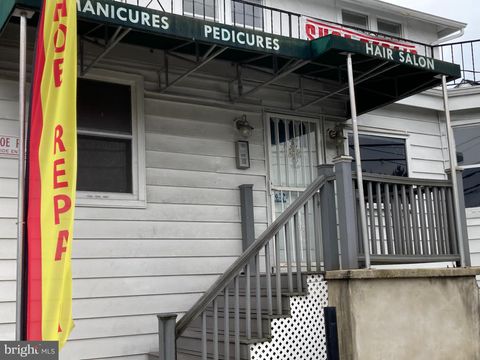 Photo of 6411 Windsor Mill Road, GWYNN OAK, MD 21207 (MLS # MDBC2152294)