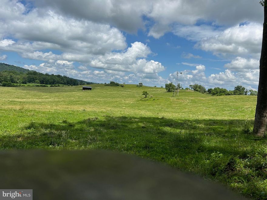 Offering 240.1 acres in 4 lots, tax id's 6949-61-2697, 6948-79-6872, 6948-79-2784, & 6949-40-8707. 
The property is in a Virginia Outdoor Foundation Conservation Easement and may be subject to one division.  Stunning views, 120+ acres of highly productive farm land.  The remaining acreage is pasture-fenced for cattle or horses.  6-bay equipment building, feed storage, and workshop.  A barn with an apartment.
House sites are for the purchaser to decide.