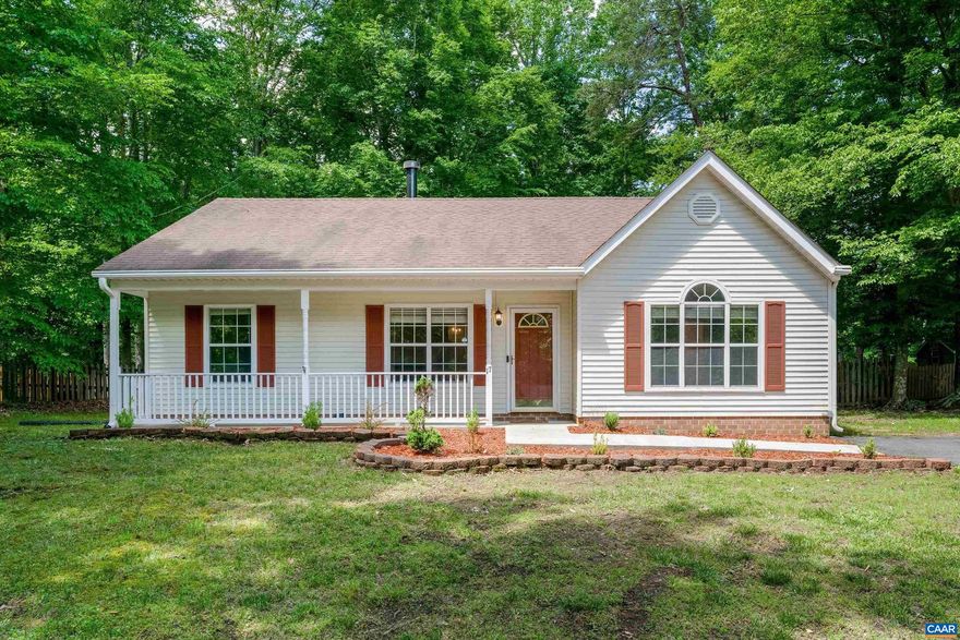 Welcome to 17 Riverside Drive!  This lovely 3 bedroom 2 bath ranch home is located outside of the gate in the Riverside section of Lake Monticello.   As you enter the home, the living room features high-valued ceilings, hardwood floors, tons of natural light, and a wood-burning fireplace.  There is a formal dining room plus an eat-in kitchen space.  The kitchen has a pantry and a side entrance door.   Age of Systems: Roof 2013.  HVAC 2017.  Water Heater 2022.  The outside features a paved driveway, a large covered front porch, a nicely landscaped front yard, and a large back deck with a fenced-in backyard. BACK ON THE MARKET DUE TO NO FAULT OF THE SELLER!,Wood Cabinets,Fireplace in Living Room