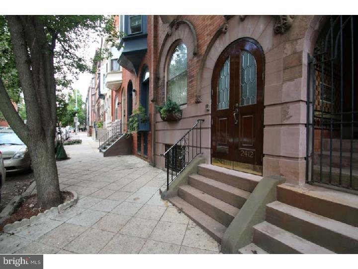 Find the perfect blend of space and convenience at this charming 3-story townhome in the heart of Fitler Square. Enter through the foyer area to a spacious and cozy living room with a fire place and original hardwood floors. Large kitchen and dining room with exposed brick, hardwood flooring and lots of windows bringing in natural sunlight. Outdoor, enclosed patio space perfect for entertaining. Nicely-sized deck off of the second floor. Five spacious bedrooms with ample closet space. The full basement is a perfect spot for storage or recreation area equipped with a full bath and steam room. Centrally located on a tree-lined street in walking distance from Schuylkill River Park, Rittenhouse Square, restaurants and shops!