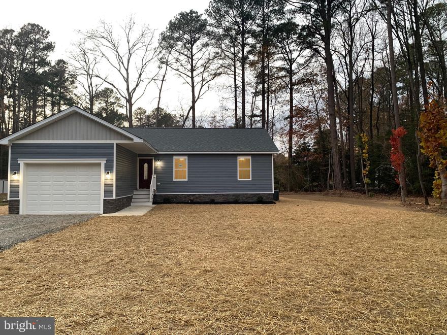 GREAT LOCATION! Construction  finished and ready to move in  .Here is your Opportunity to be 35 Minutes to Dahlgren ,35 Minutes to Bowling Green /A.P. Hill ,and under a Hour of Driving to Fredericksburg. Easy access to Maryland via Harry Nice Bridge .Located in the boating community of Placid Bay Estates a Friendly Golf Cart Community with/optional HOA. House has 1288 SQF with One Car Garage,3 Bedrooms and 2 Bathrooms ,12x12 Deck and a Small Front Porch .Some of the Upgrades are Upgraded Carpet and pad,. Tile Floors and Walls in Bathrooms,Luxury Vinyl Planks in Living Room ,Dining Room and Kitchen ,Stainless Steel Appliances Granite Counter Top and Recessed Lighting ,Washer and Dryer included also .Voluntary HOA fee includes the use of Boat Ramp, Community Center, Picnic grounds and access to fresh water lakes and a Fishing Pier and Access to Potomac River via Mattox Creek