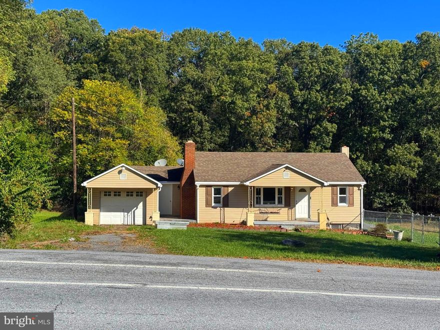 Charming country home located at 3120 National Pike in Hancock, Maryland. This three-bedroom, one-bath home offers approximately 1,008 square feet of living space and sits on a spacious lot ideal for a small farm or country retreat. The property has been recently painted, giving the interior a fresh and inviting feel throughout. The exterior features existing chicken coops and open space ready for your own country farm setting, garden, or outdoor projects.

Built around 1950, the home includes a detached garage and ample driveway parking. The property is serviced by well and septic systems and offers the perfect balance of privacy and accessibility. Conveniently located along National Pike, it provides easy access to I-70 and the surrounding towns while maintaining a quiet, rural atmosphere.

This property is move-in ready and offers an excellent opportunity to enjoy country living with plenty of room to grow. Contact Brian Coester for details