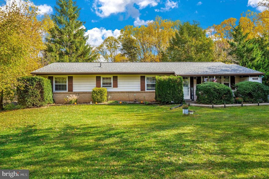 Welcome To Old Orchard Estates! Charming Rancher with Unlimited Potential! Nestled on a generous  .52 acre lot backing to woods with a serene creek in a peaceful cul-de-sac  This home features a front porch, private driveway, beautiful hardwoods throughout, entryway,  living/dining area, family room, three bedrooms including a primary bedroom with double closets, full primary bath, additional full bath, deck, new roof 2019  and 2 car detached garage providing extra storage and parking.  Cozy up by the fireplace with the Vermont Castings Wood Stove in the spacious family room. The deck is perfect for outdoor gatherings or enjoying the tranquil, private setting! This property is a hidden gem and sold AS-IS condition providing a canvas  for you to customize!  Best of all, there are NO CITY TAXES and HOA  in this established neighborhood, while still close enough to all the amenities that Frederick has to offer and minutes to Montgomery County!